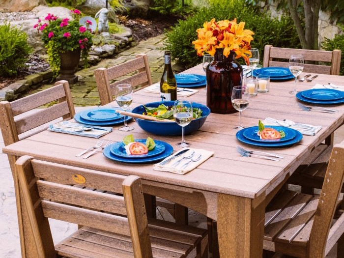 black wooden garden table and chairs